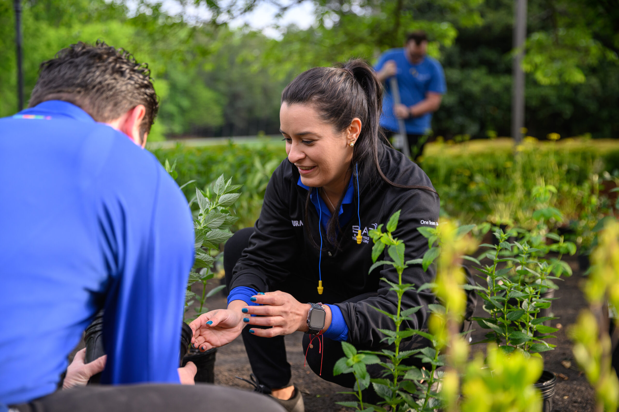 An employee volunteering at the Pollinator garden in Tobaccoville, North Carolina.