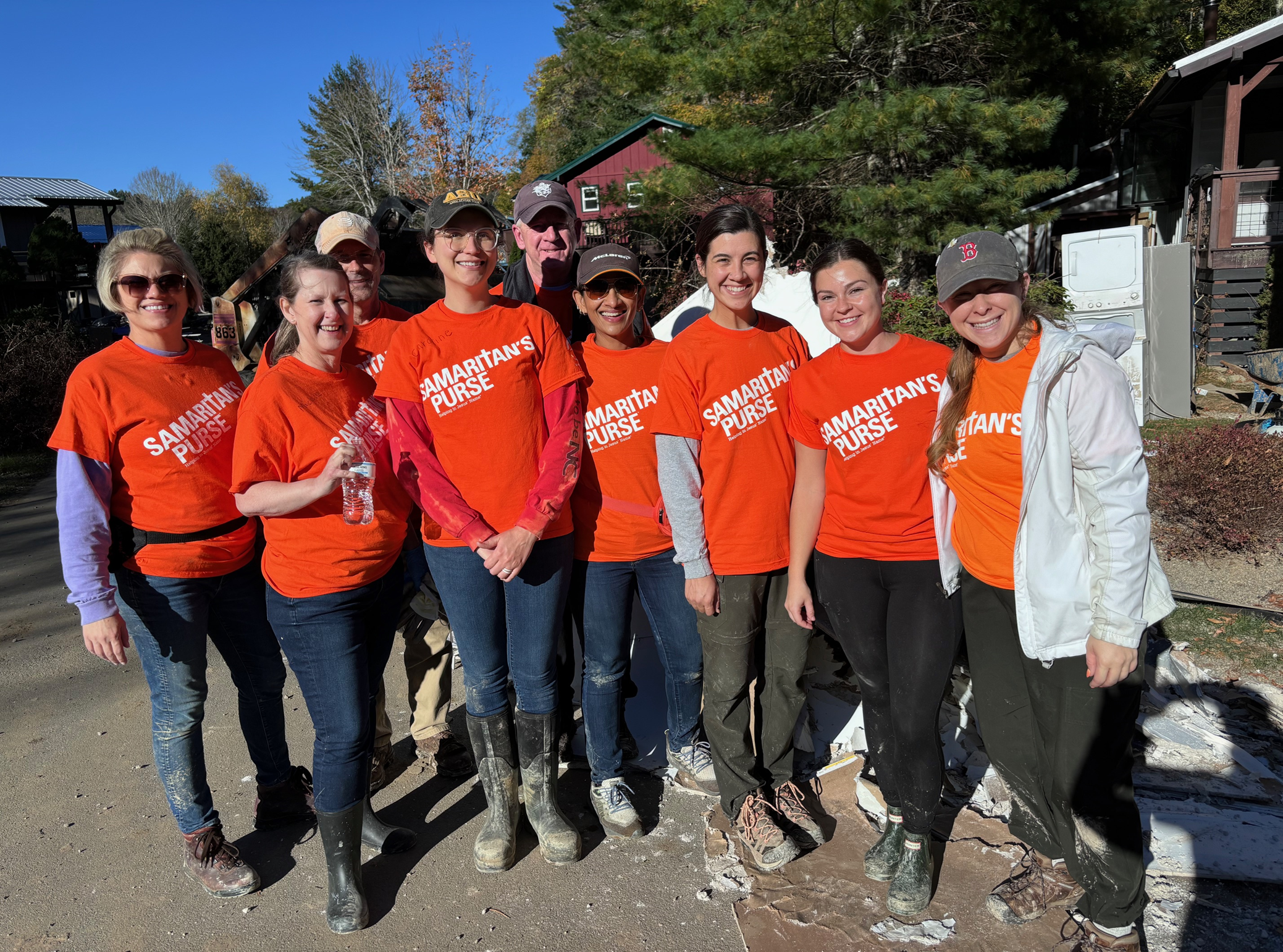 A group of employees help Samaritan's Purse with recovery efforts after Hurricane Helene in Western North Carolina.